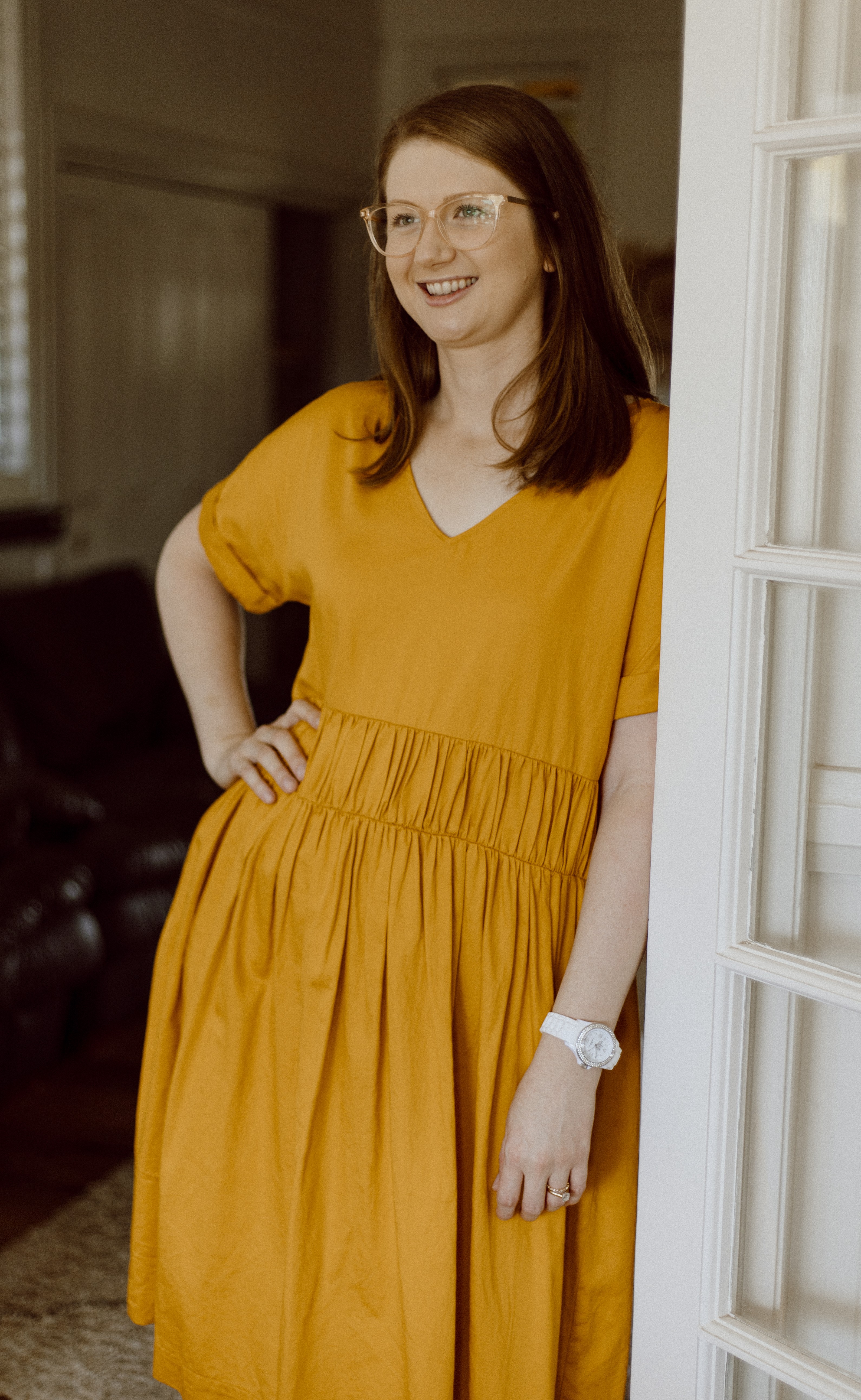 Children’s Oral Health Therapist demonstrating holistic dental health education with a playful puppet during an online consultation setting.