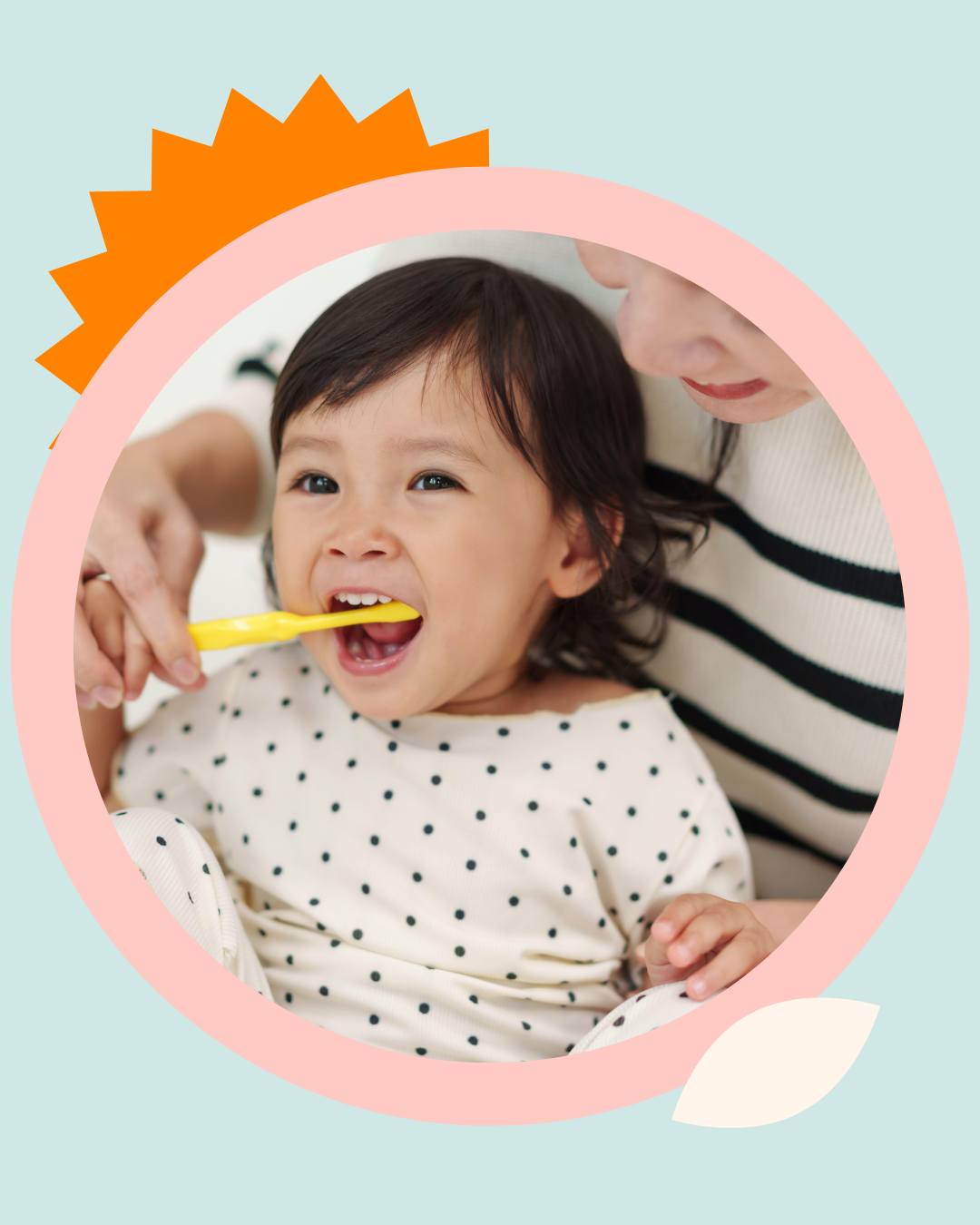A parent brushing a toddler's teeth to support children's dental health and daily oral hygiene habits.