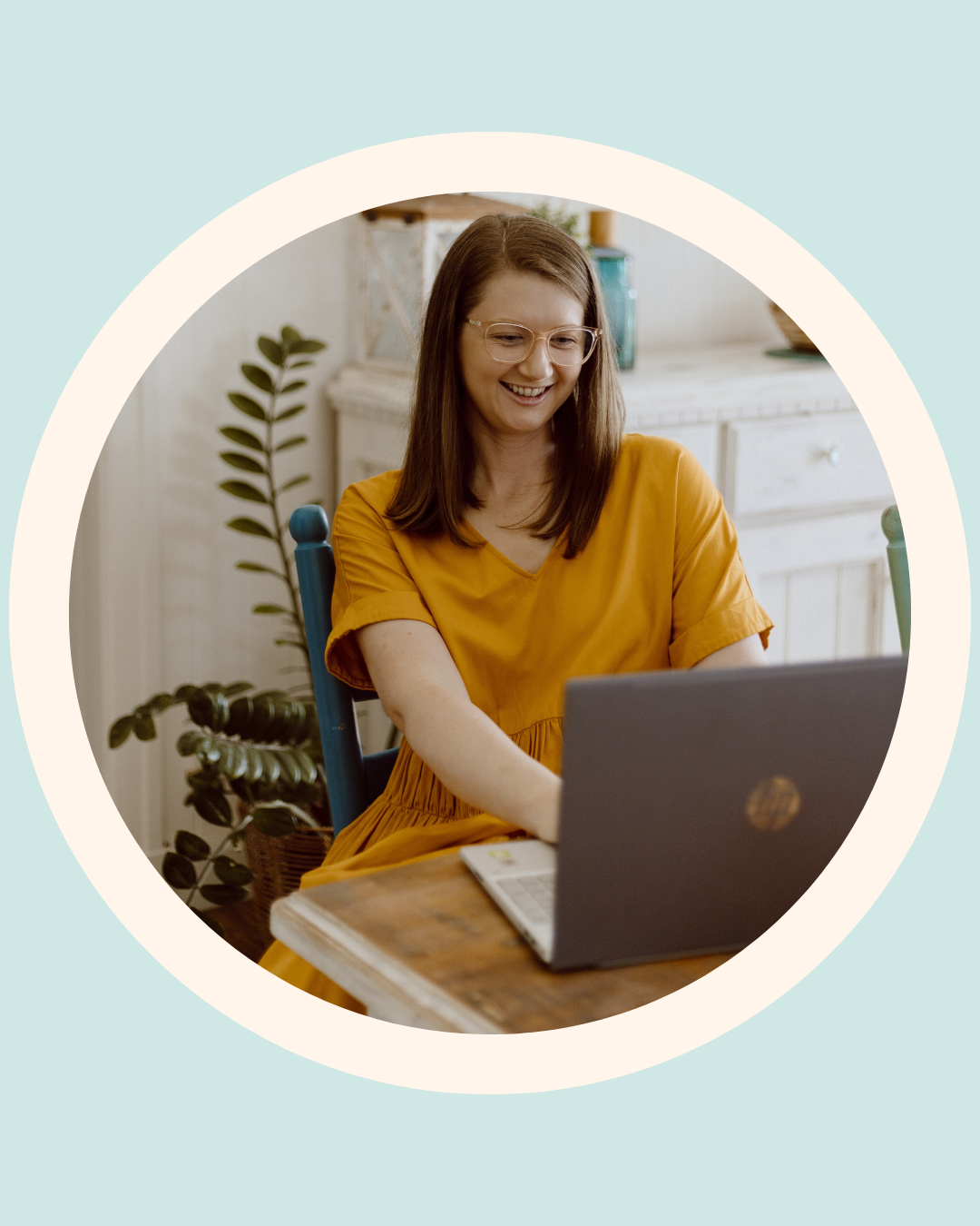 Mel Van Schelven, Oral Health Therapist and founder of The Face Place, working on her laptop while creating educational content for parents about children’s oral health, sleep, breathing and dental development.