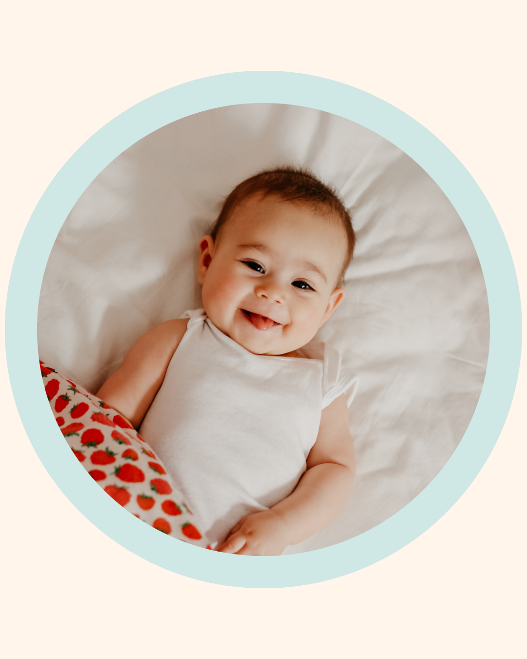 Smiling baby with tongue visible, representing The Face Place Oral Ties Masterclass for parents learning about tongue and lip ties in babies.