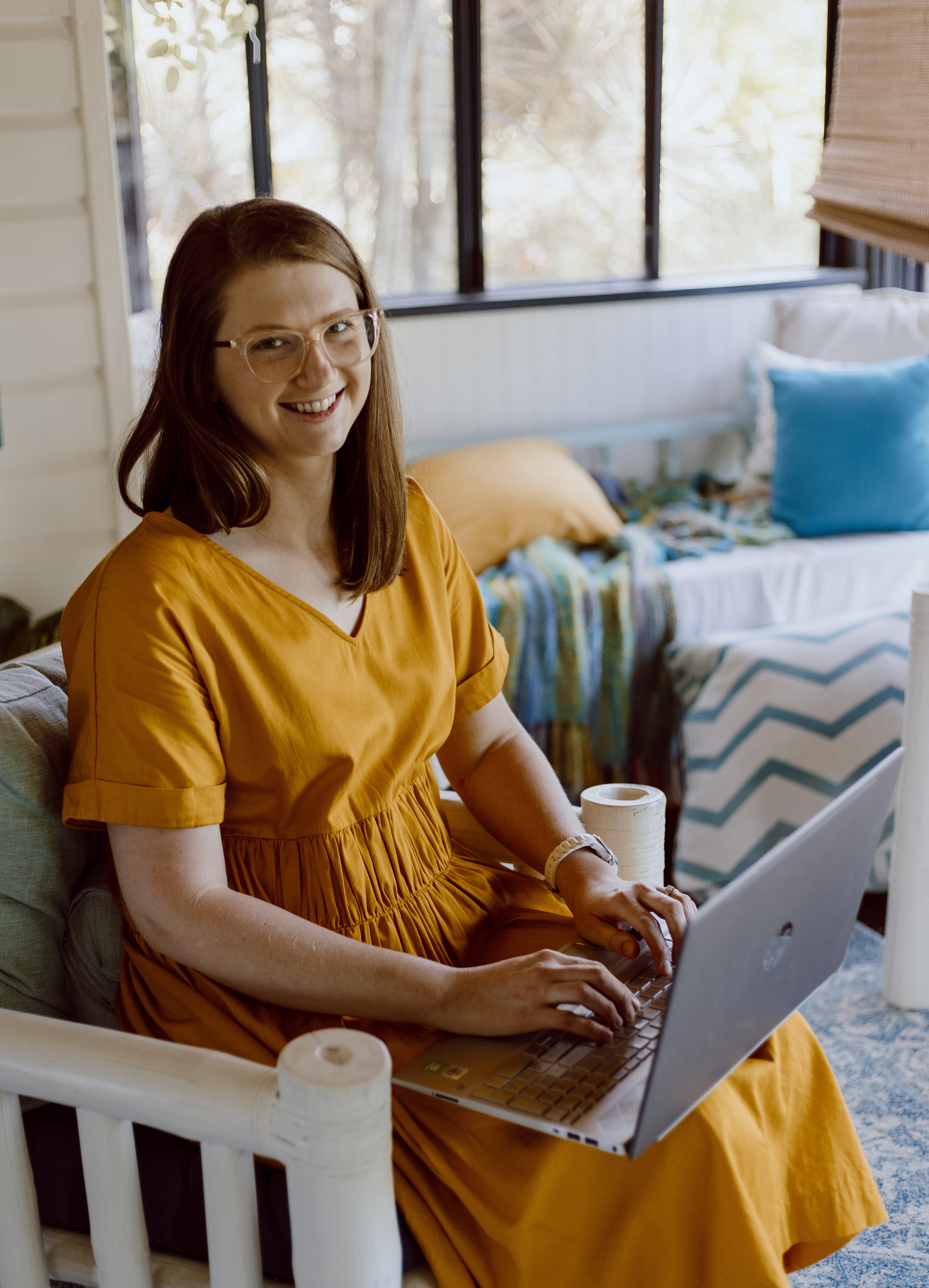 Children’s Oral Health Therapist demonstrating holistic dental health education with a playful puppet during an online consultation setting.