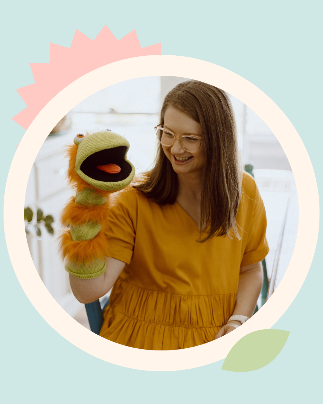 Mel Van Schelven, Oral Health Therapist and Orofacial Myofunctional Therapist at The Face Place, smiling while holding a puppet during a children's oral health consultation.